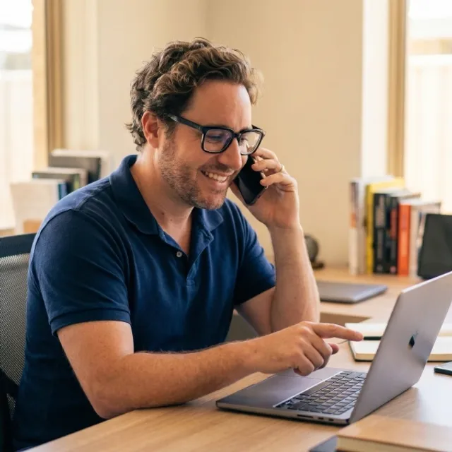 Lee from Digital Den helping a customer over the phone