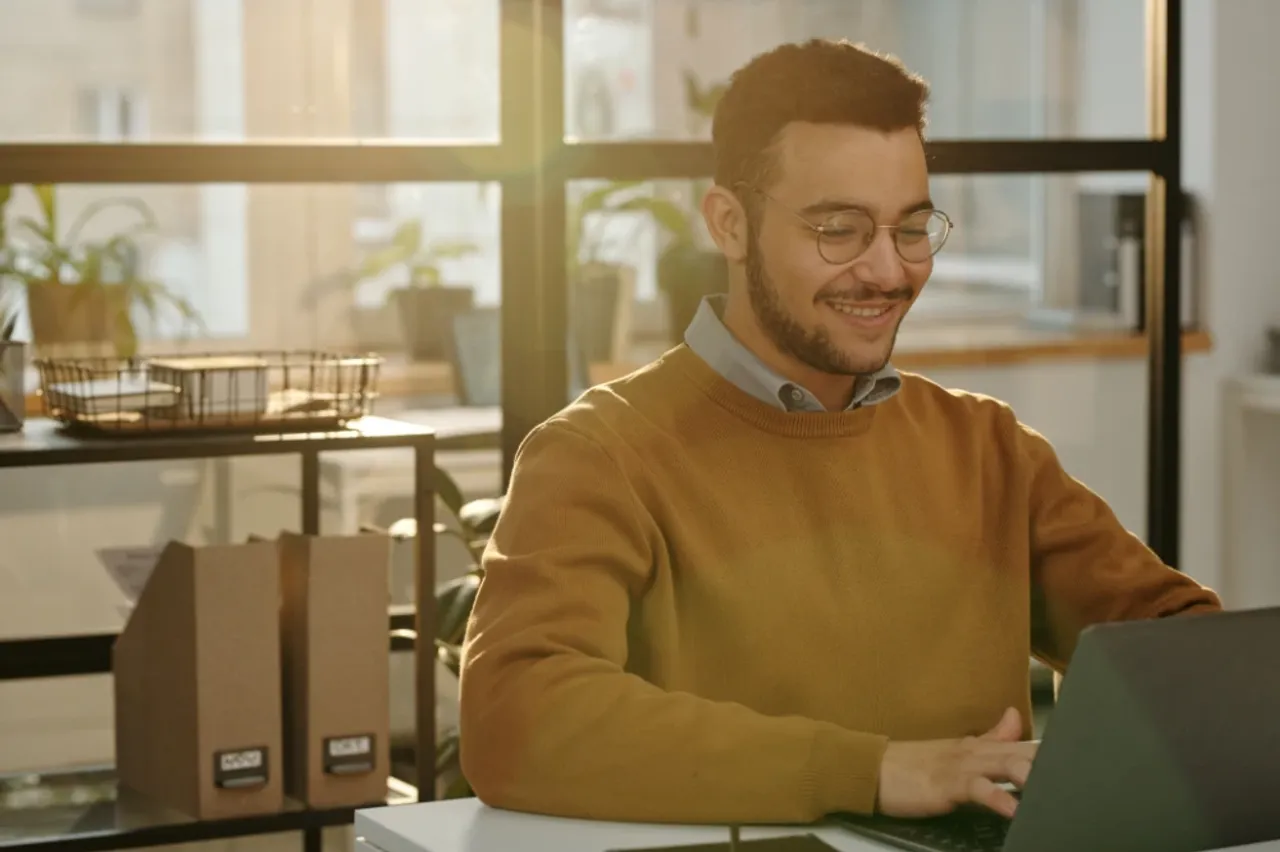 Business owner exploring AI tools on laptop